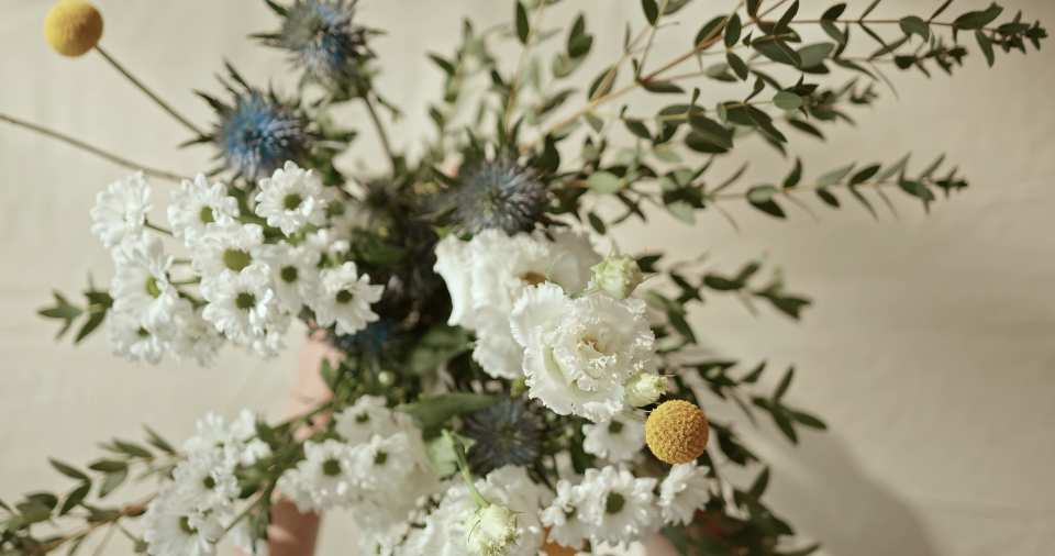 Florist arranging a wedding bouquet